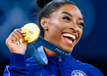 Simone Biles with the 2024 Olympic Gold Medal for vault