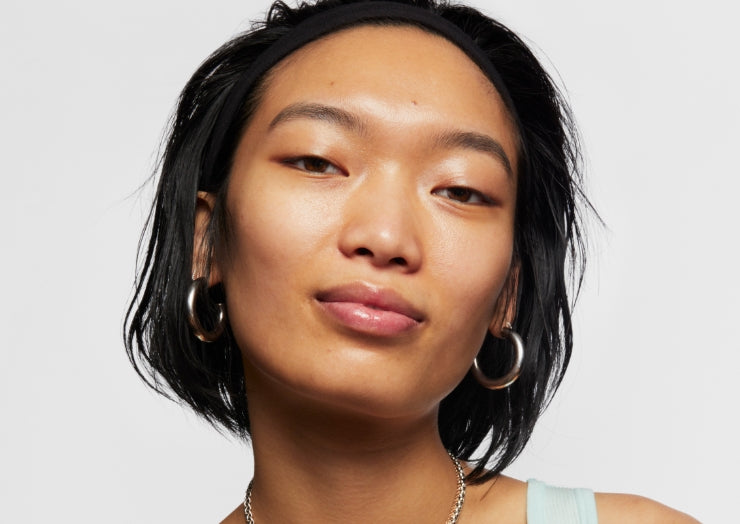 Model with fresh face using Milk Skincare
