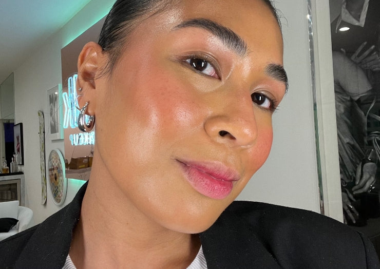 Selfie of a woman with a medium skin tone wearing Milk Makeup Lip + Cheek in Quickie