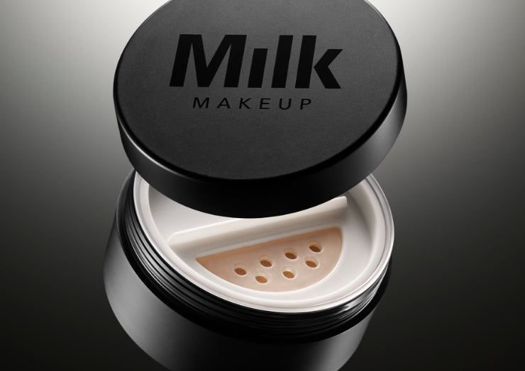 Product shot of Milk Makeup Pore Eclipse Matte  Translucent Setting Powder on a gradient gray-to-black background