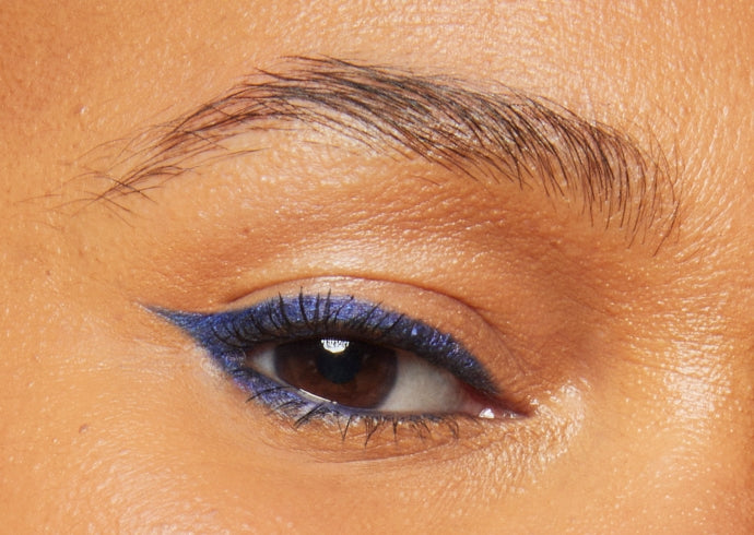 Close-up of model's eye wearing Milk Makeup Infinity Long Wear Eyeliner in Time