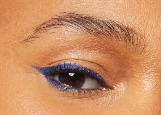 Close-up of model's eye wearing Milk Makeup Infinity Long Wear Eyeliner in Time